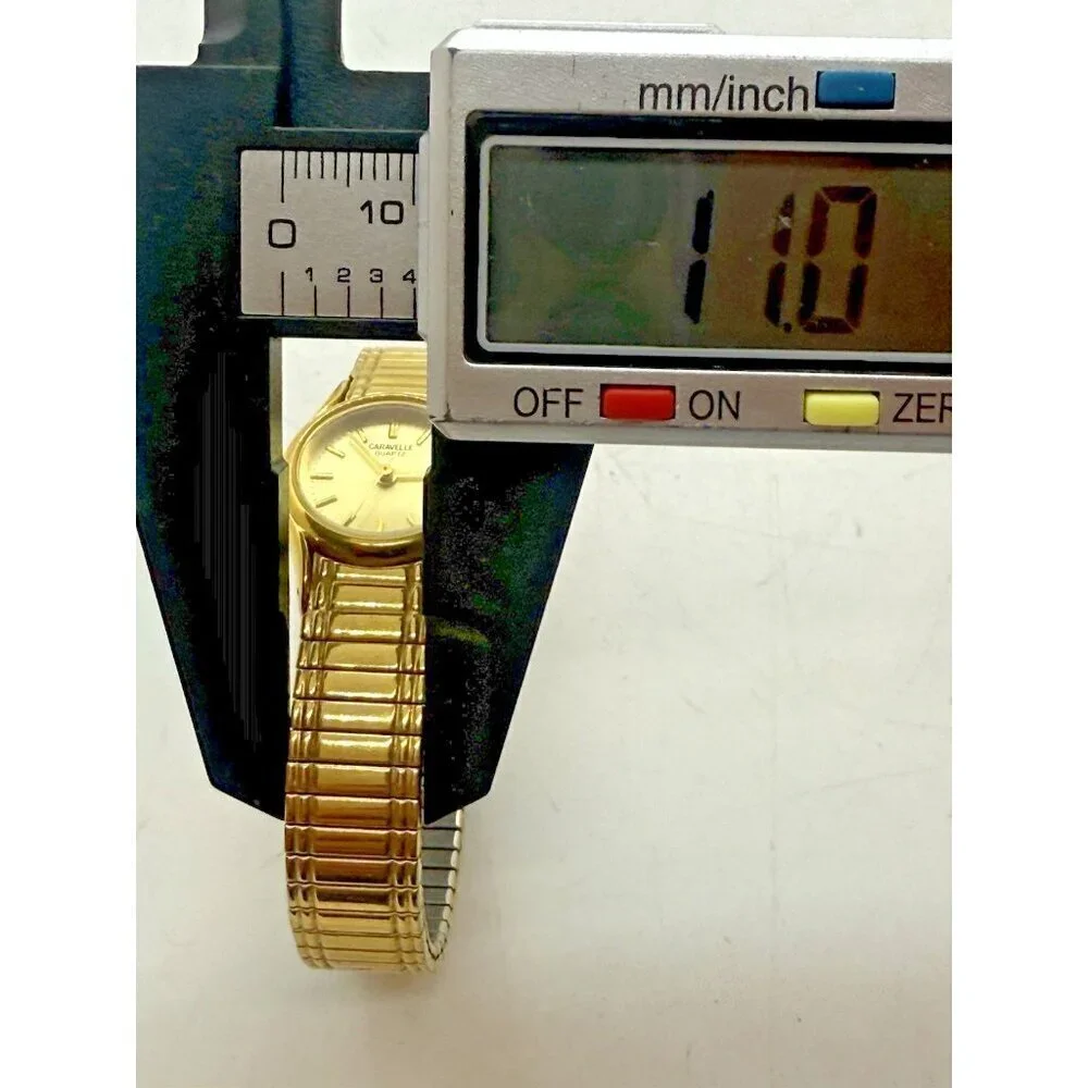Vtg Caravelle Quartz Women's Watch Gold Tone Stainless Steel Stretch Bracelet